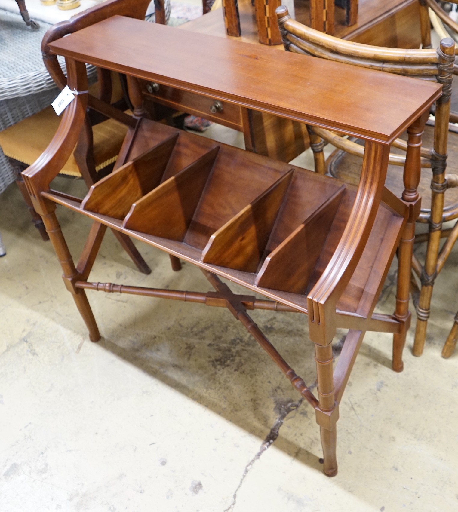 A reproduction mahogany five division book table, width 90cm, depth 40cm, height 84cm